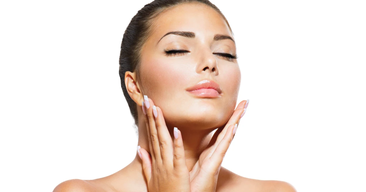 Close-up of a woman with a lifted jawline and youthful skin, showcasing facelift results in Laguna Hills, CA.